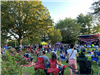 residents gathered on the village green for a summer concert