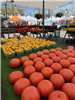 image of tomatoes on a table at the farmers market