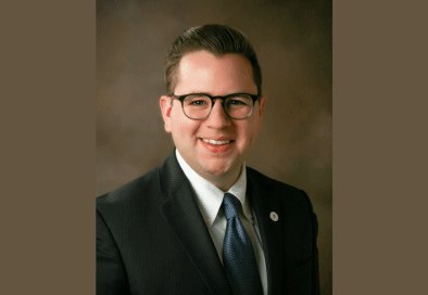 headshot of Council President Greg Vartan