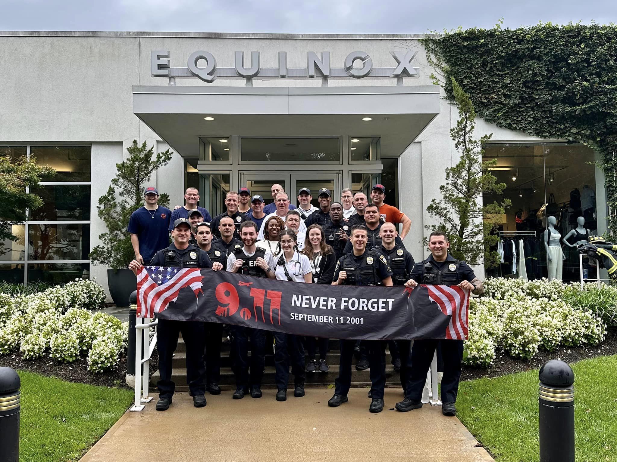 police and fire department group photo for september 11 memorial stair climb event