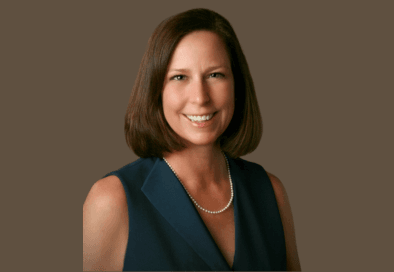 Summit Mayor headshot on brown background