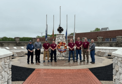group photo of firefighters at memorial service