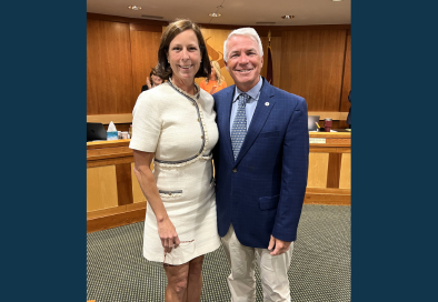 summit nj mayor and councilmember posing for a photo in council chamber