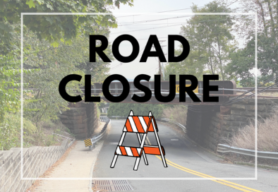 road closure graphic with faded photo of bridge in the background