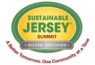 green and yellow sustainable jersey logo showing summit is silver certified