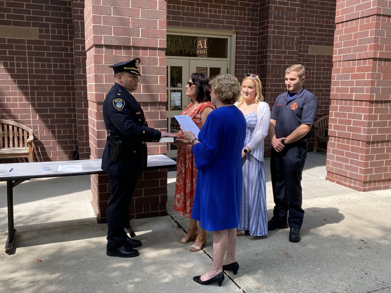 image of Mayor Nora Radest swearing in Police Chief Steven Zagorski