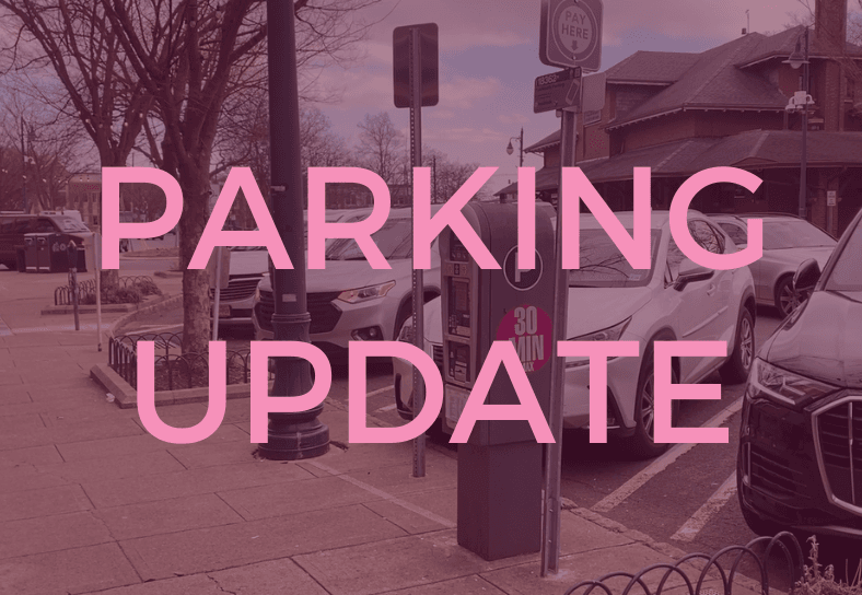 maroon tinted graphic with image of cars parked on a street in the background