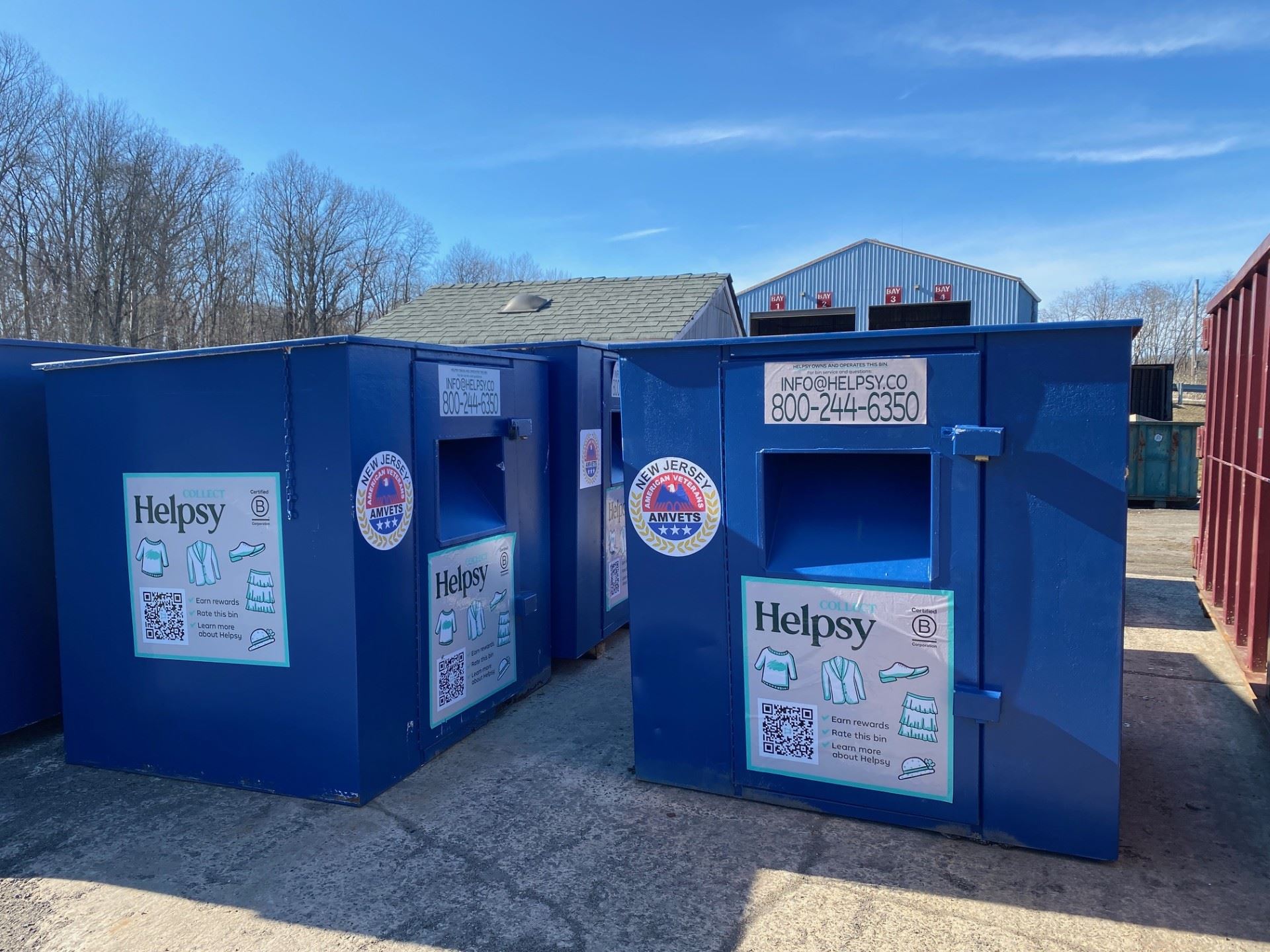large blue recycling bin at municipal transfer station