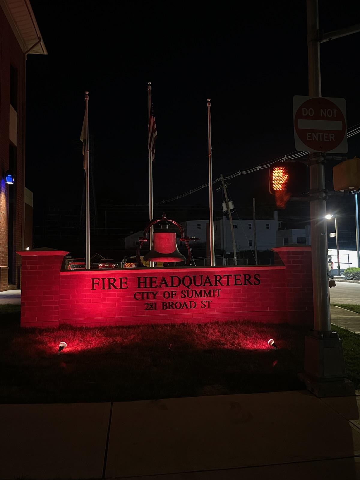 firehouse illuminated in red light