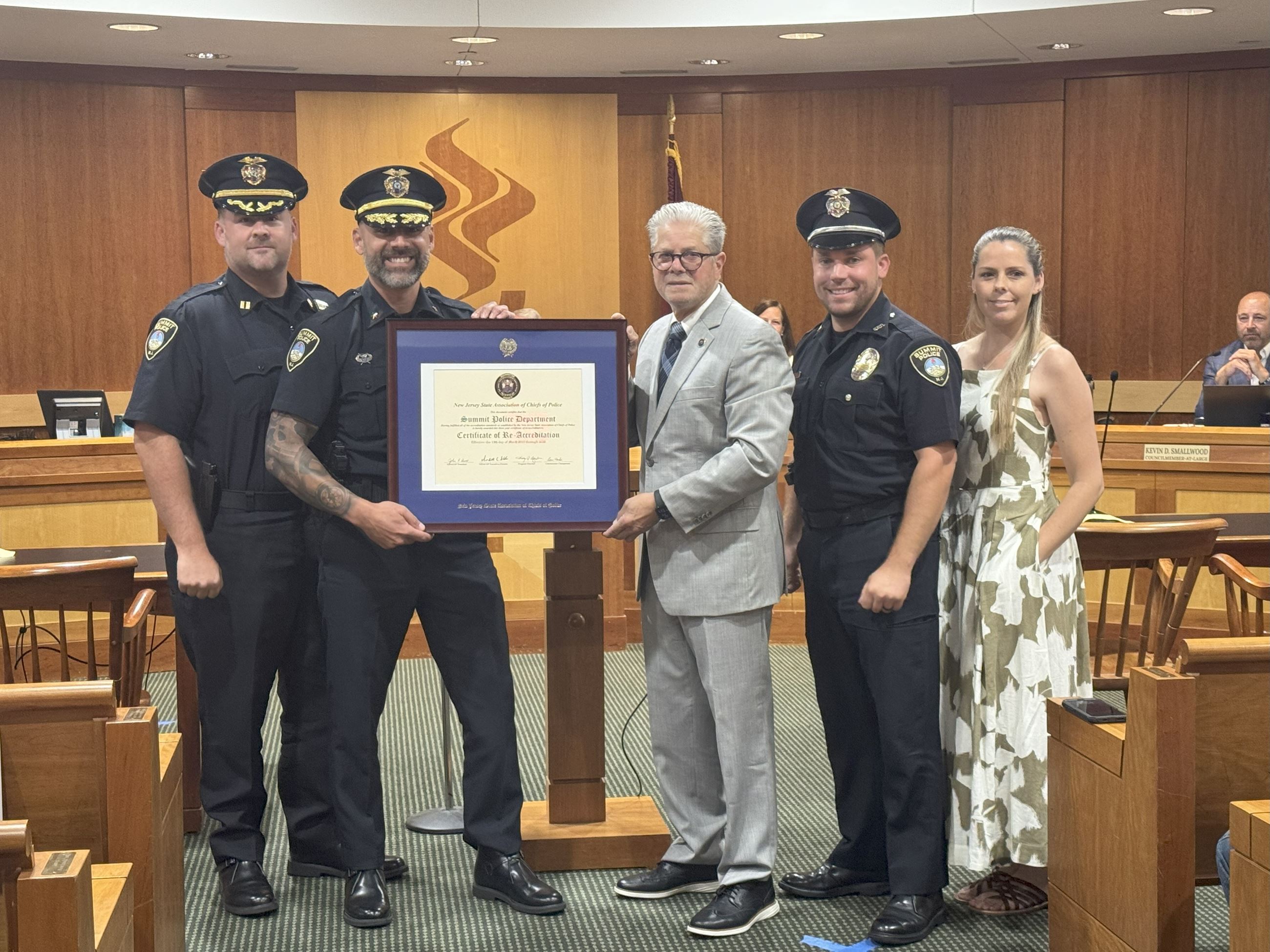 police officer group photo in council chamber